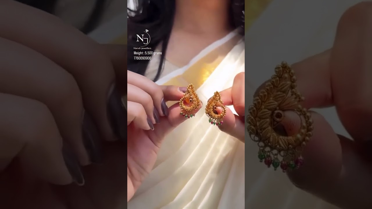 Latest gold peacock earrings design #like #subscribe #22k#gold#collections