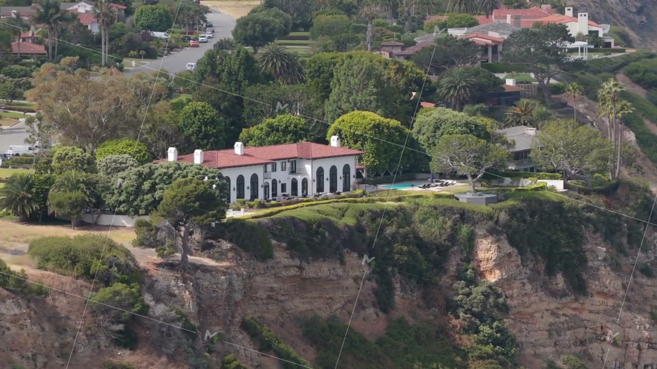 Scenic flight above Palos Verdes Peninsula revealing luxurious hillside homes and oceanfront cliffs