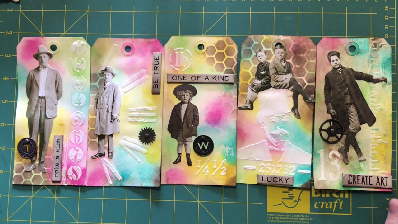 Altered tags using Tim Holtz products