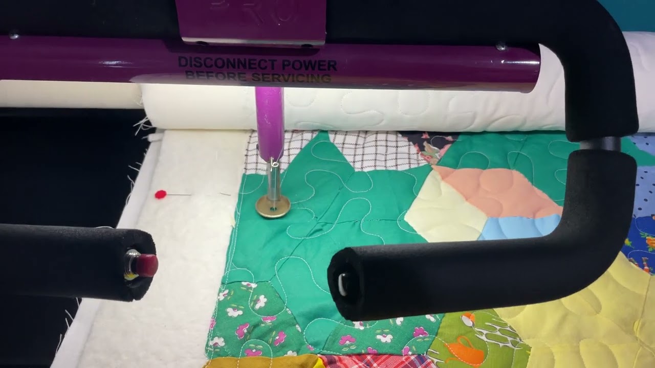 Four long arm quilting machines all quilting at the same time. ￼