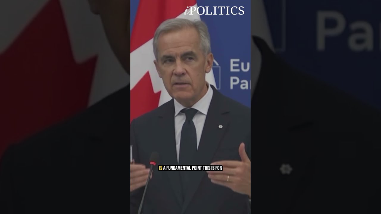 Mark Carney speaks to reporters after European Parliament address