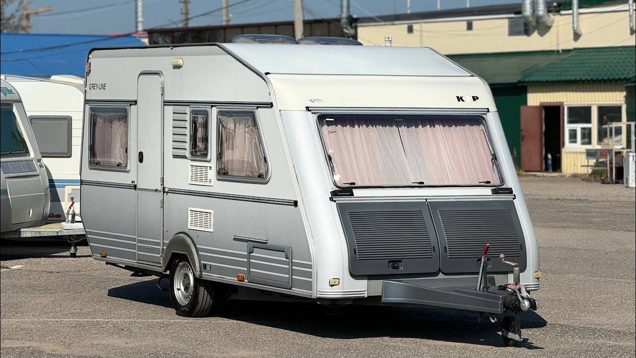 Обзор прицепа для путешествий Kip-44 T, год выпуска 2000, 4 спальных места.
