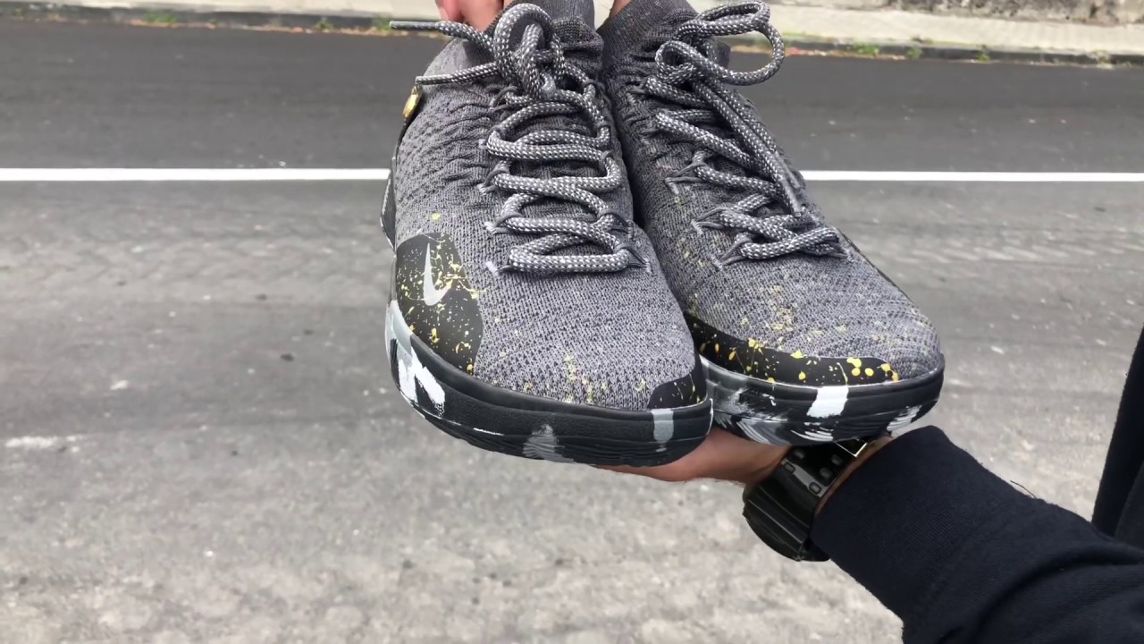 NIKE KD 11 GOLD SPLATTER ON FEET