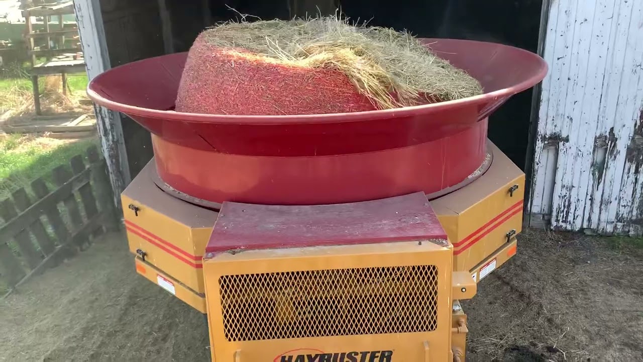 White 4-225 4wd Tractor grinding Hay with a Haybuster H-1000 Tub Grinder