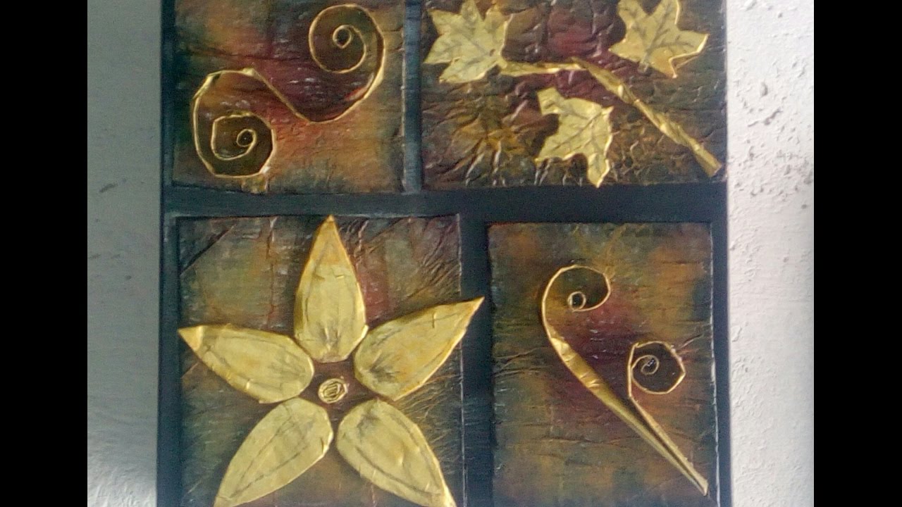 Cuadro decorativo hecho de cartón y periódico. Decorative picture made of cardboard