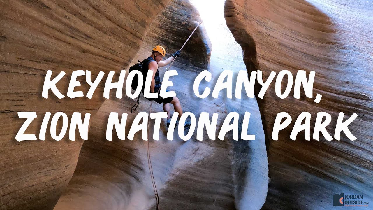 Rappelling and Canyoneering in Keyhole Slot Canyon in Zion National Park, Utah