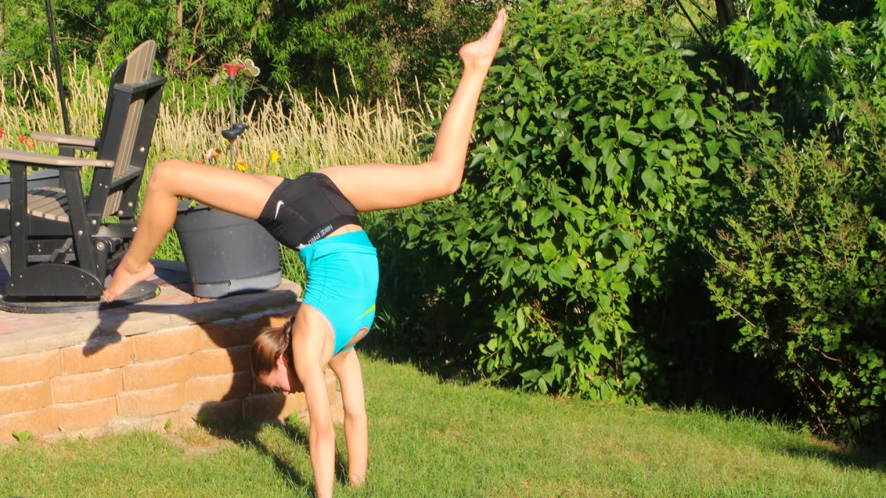 How to do a Handstand + How to Hold a Longer Handstand!