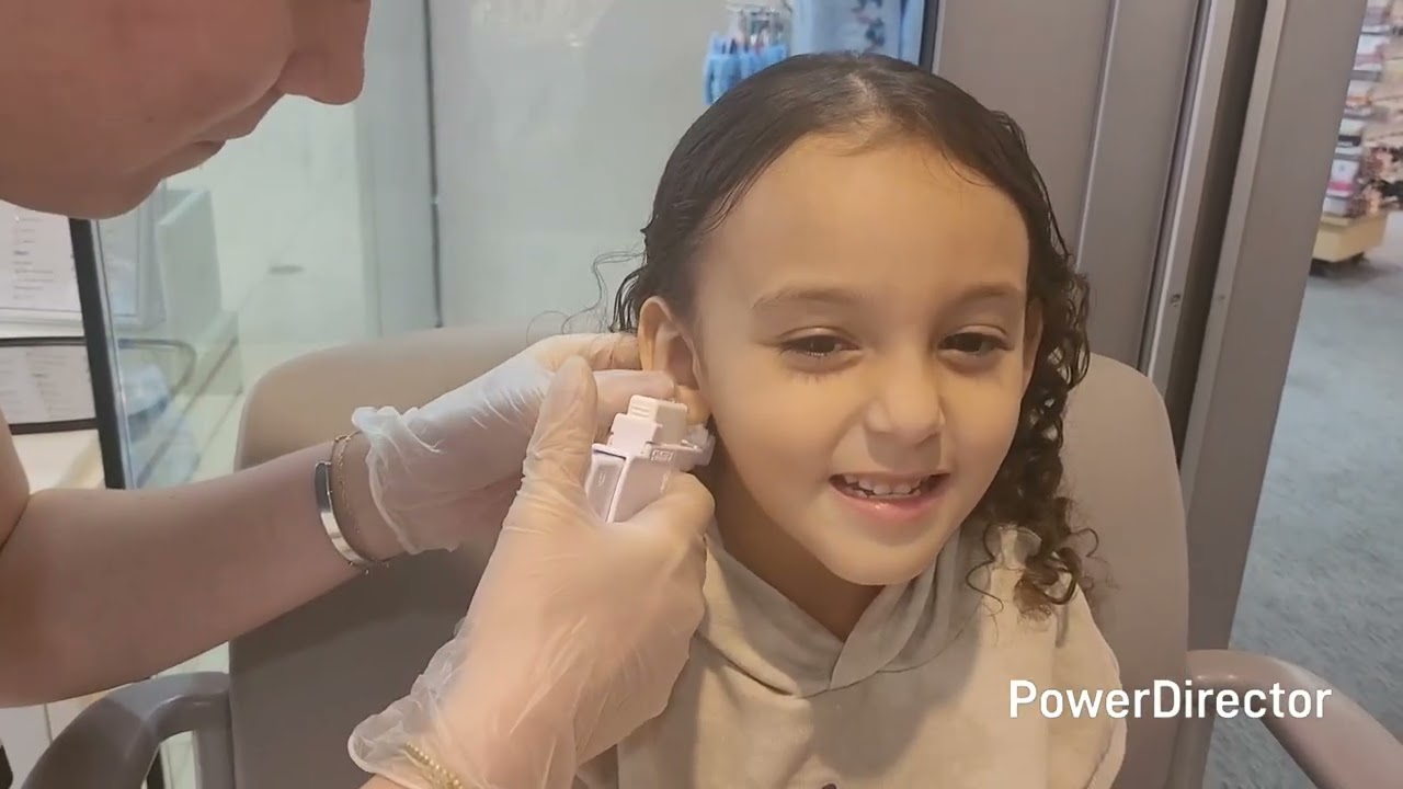 Miss Millie gets her ears pierced for her birthday