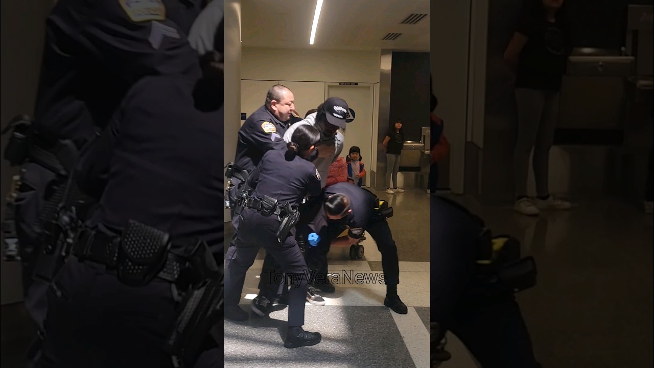 LAX airport police making arrest for a 100000 warrant at LAX Airport