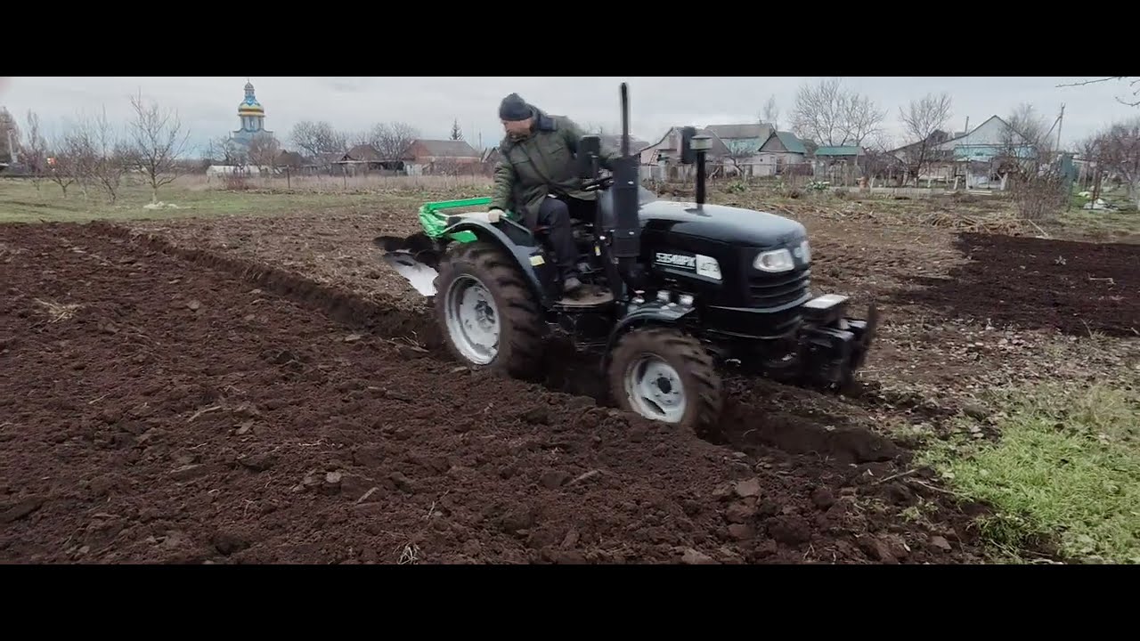 Мінітрактор  з плугом 2-30