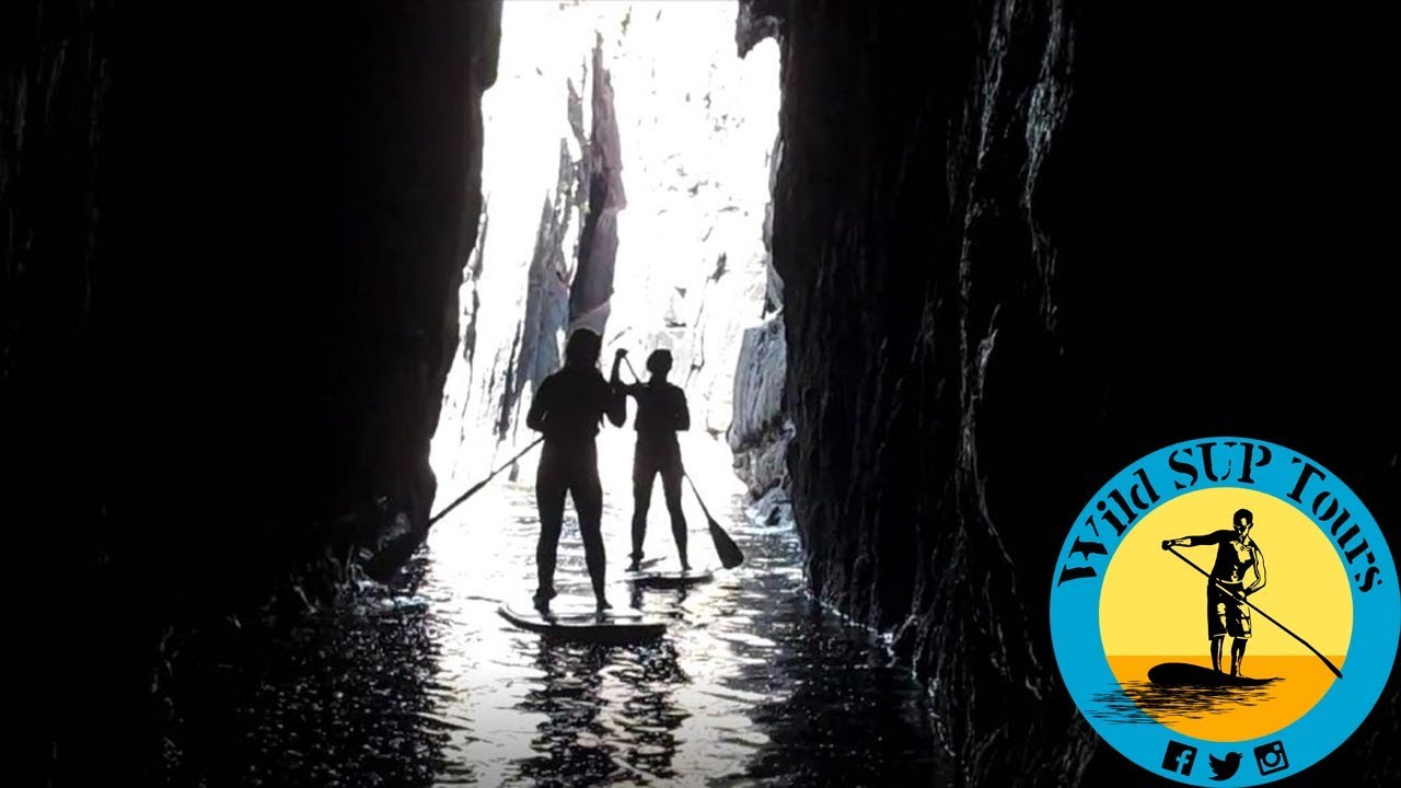 Stand Up Paddle Boarding Adventures - Exploring Caves - Paddling - Having Fun
