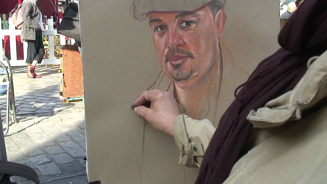 A Pastel portrait demonstration by place du tertre artist Agnes .mpg