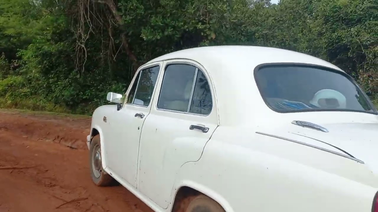ambassador car drive on village road