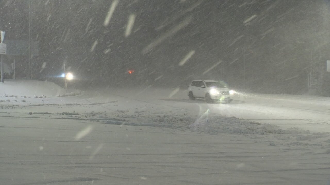 People take caution driving through snowy conditions in Government Camp
