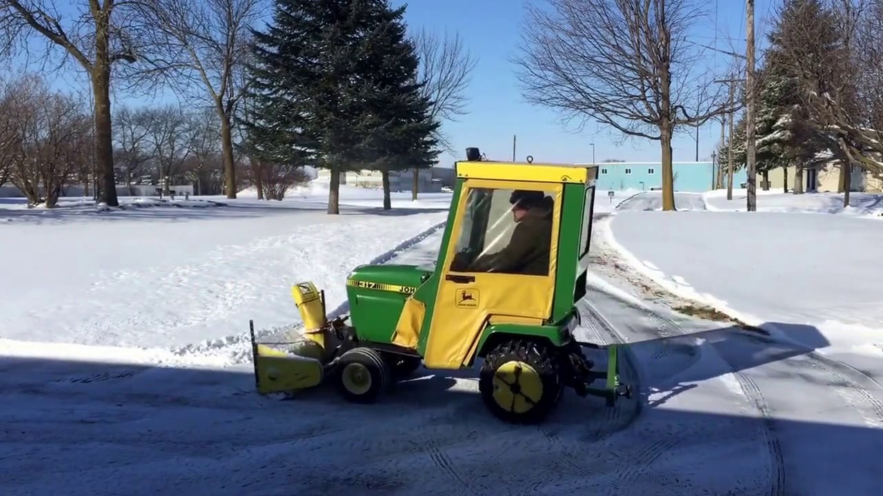 317 John Deere with number 49 blows snow Winsted, Minnesota
