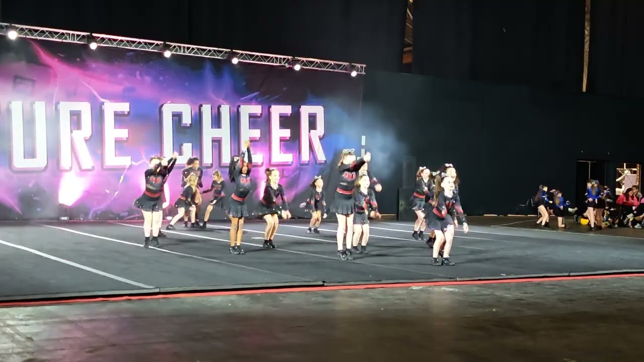 Alexis First Cheerleading Competition - Giants Elite Peach