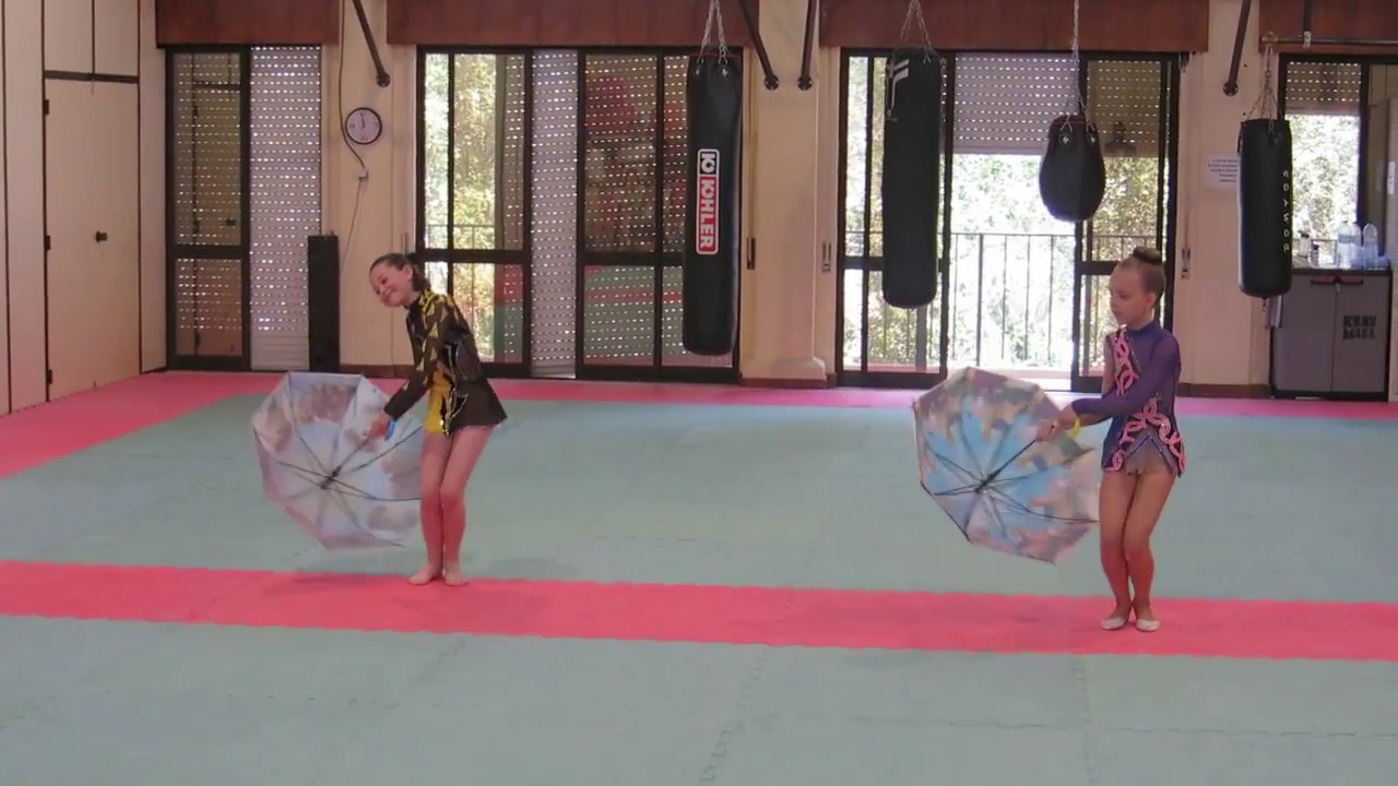 Ginastica ritmica.Dança com guarda-chuva.