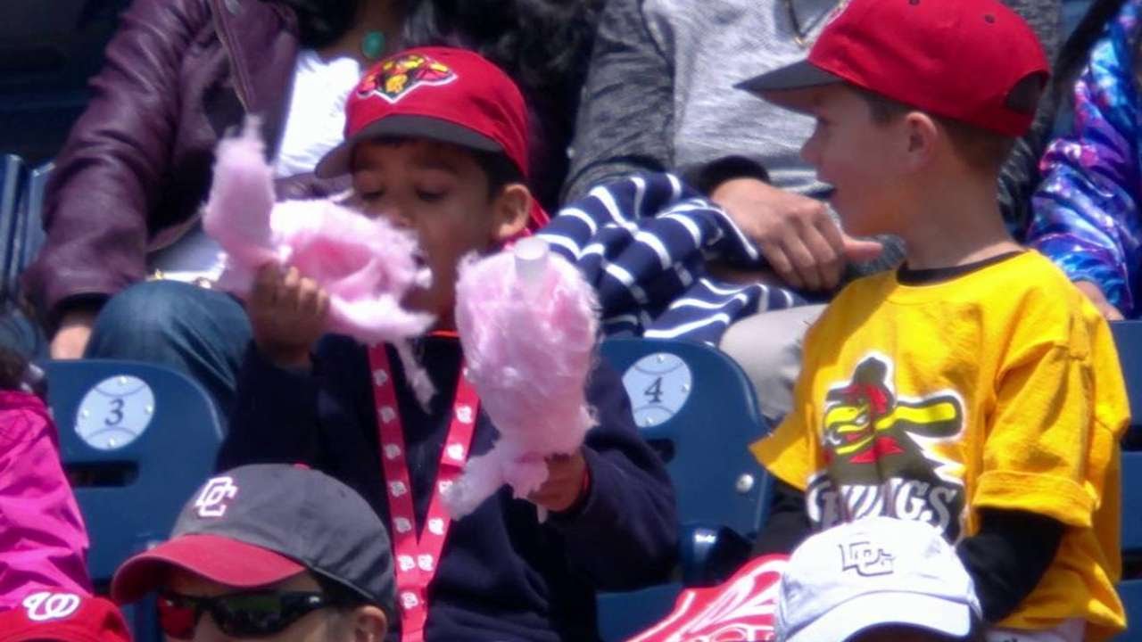 Kid eats cotton candy, announcers have fun