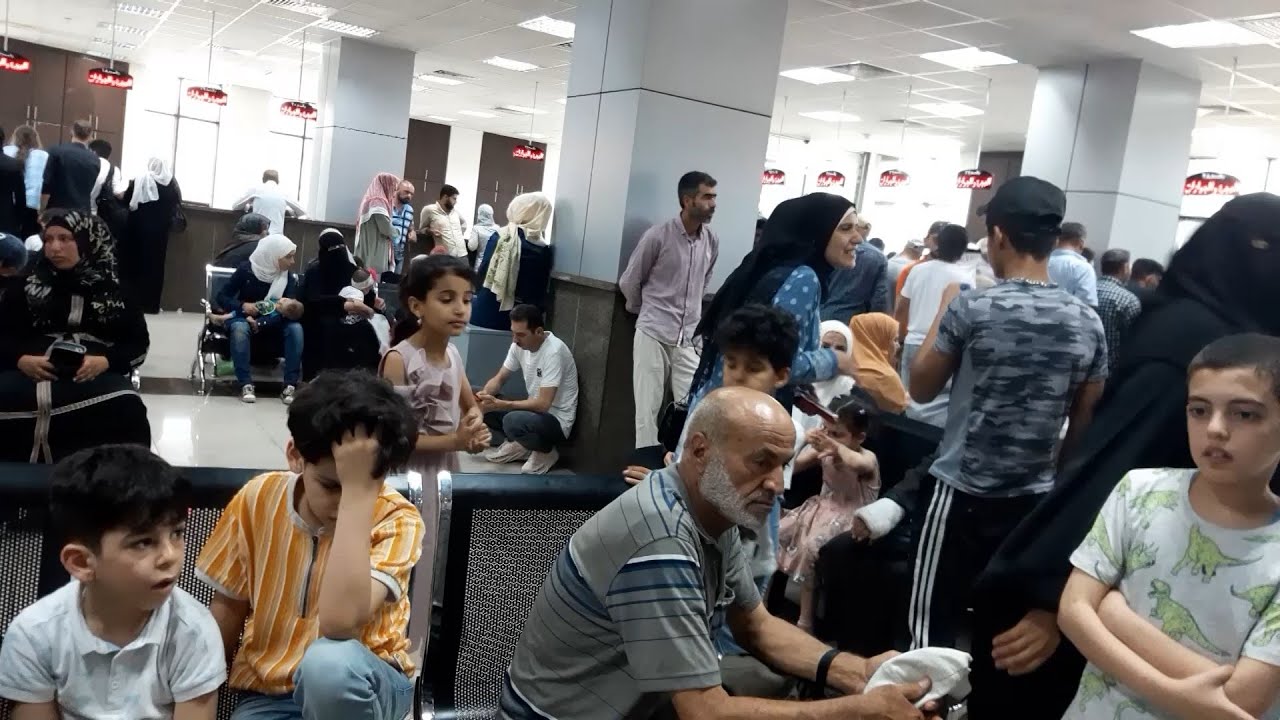 خاص..تصوير سري في مبنى الجوازات الجديد في دمشق | لم الشمل