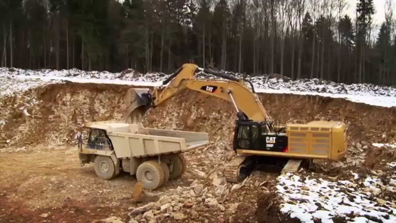Cat&reg; 390F Excavator at Work Digging and Loading