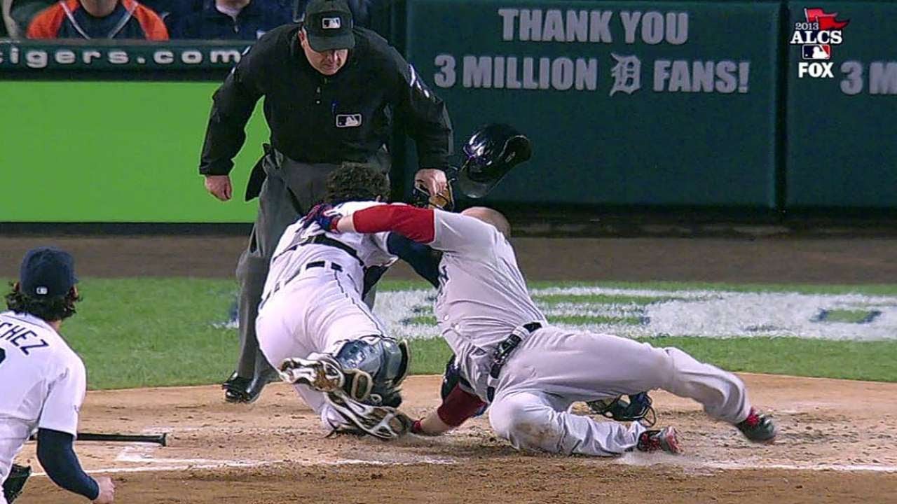 Avila hangs on after Ross plows into him
