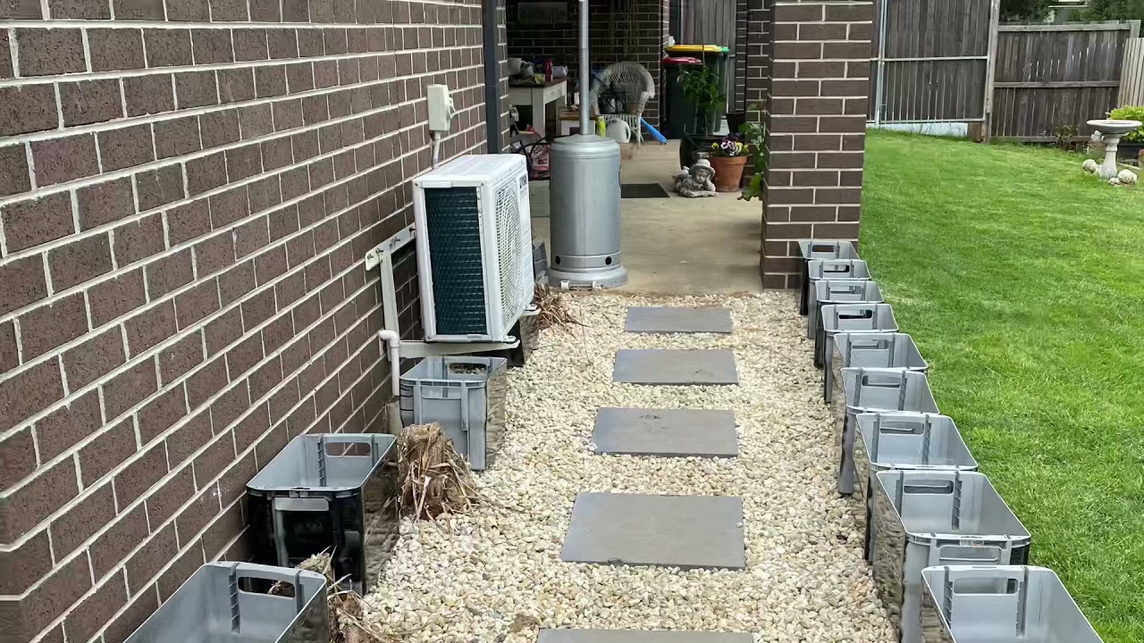 Creating small veggie garden with recycled plastic containers with my grandson!