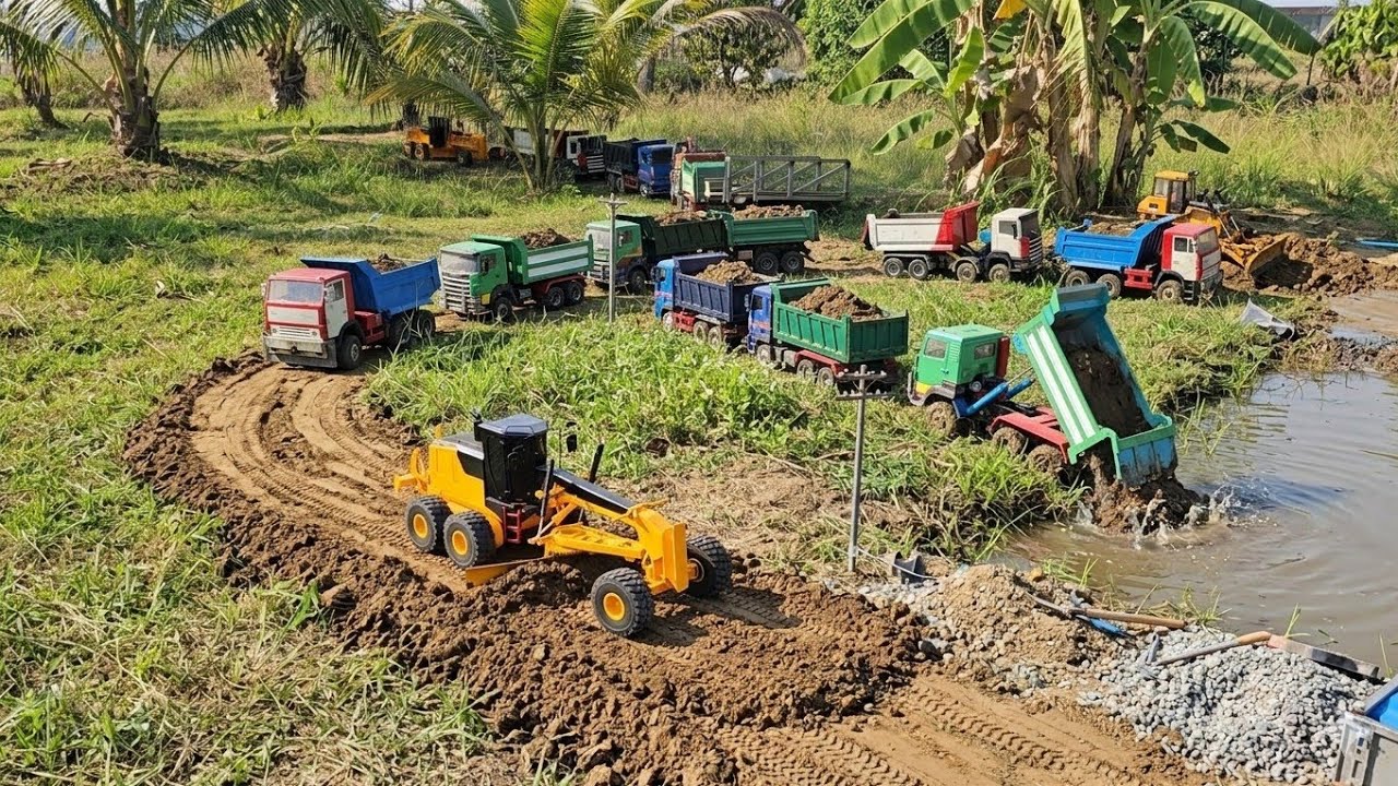 Full Construction of a river crossing road with a truck Kamaz Hino Scaina man Grader Dozer Excavator