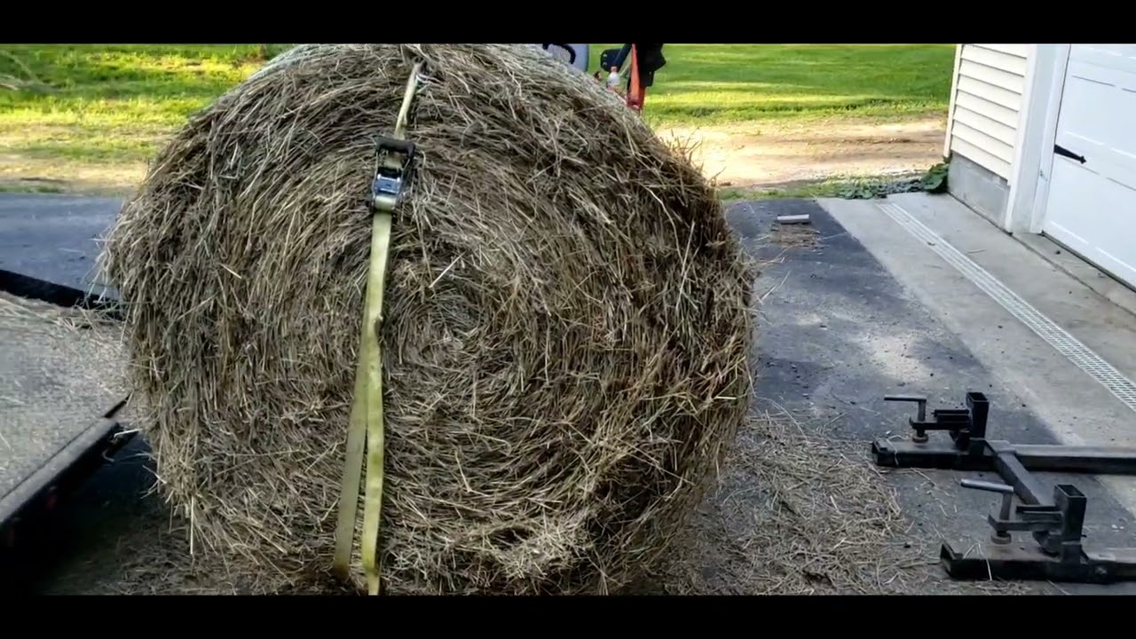 How move/stack 4x5 round bales with a 23hp Massey Ferguson GC2310/1700 Subcompact tractor
