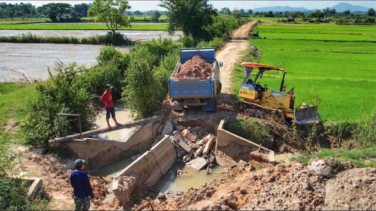 Backfill the damaged canal and drainage system to link the road for farmers’ travel.