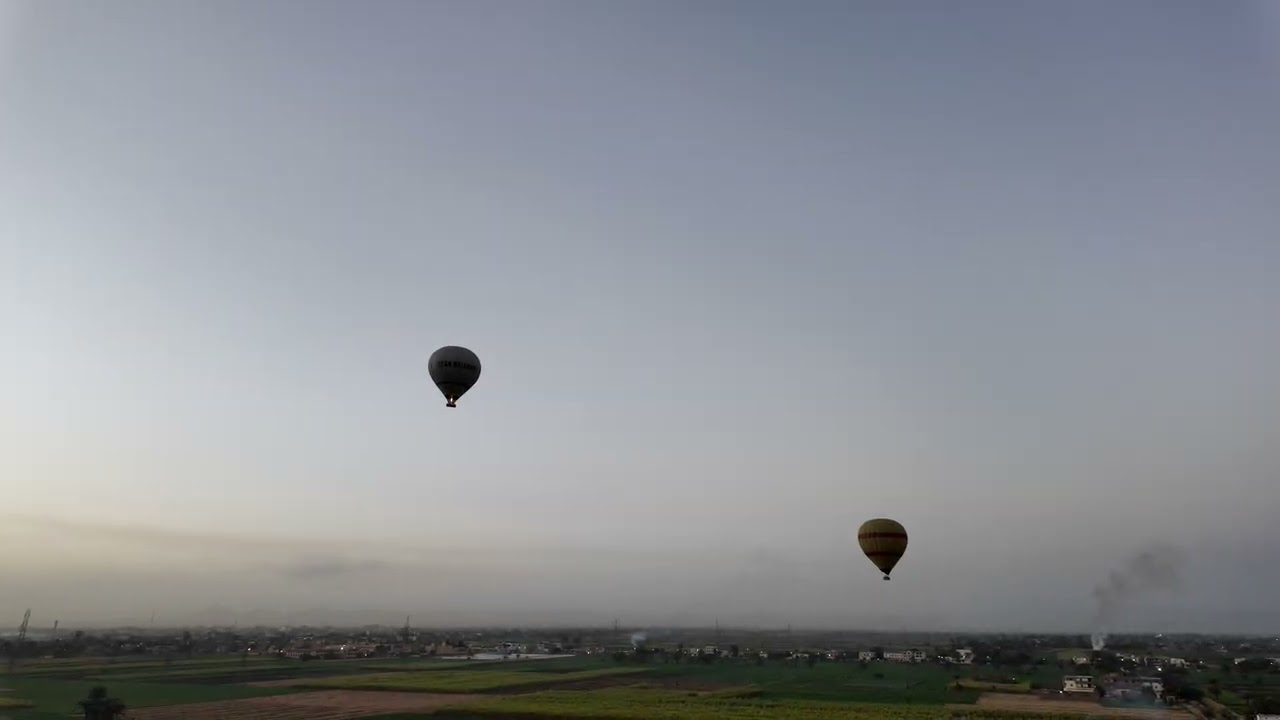 Hot air balloon at sunrise over Luxor, Egypt 