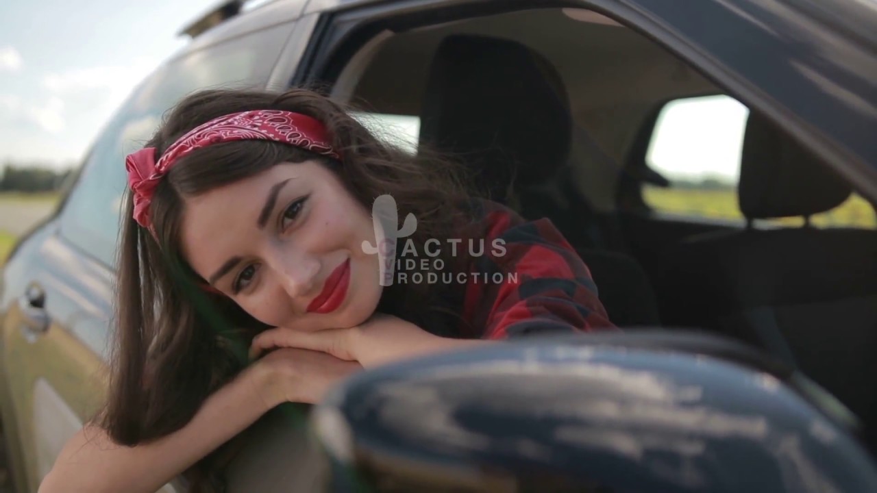 Carefree girl enjoying summer roadtrip vacation