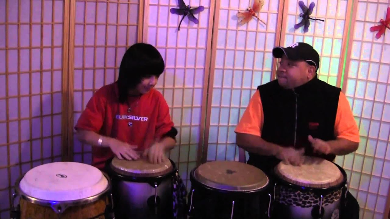 Richie Flores playing with Conga Boy Shun Bitar