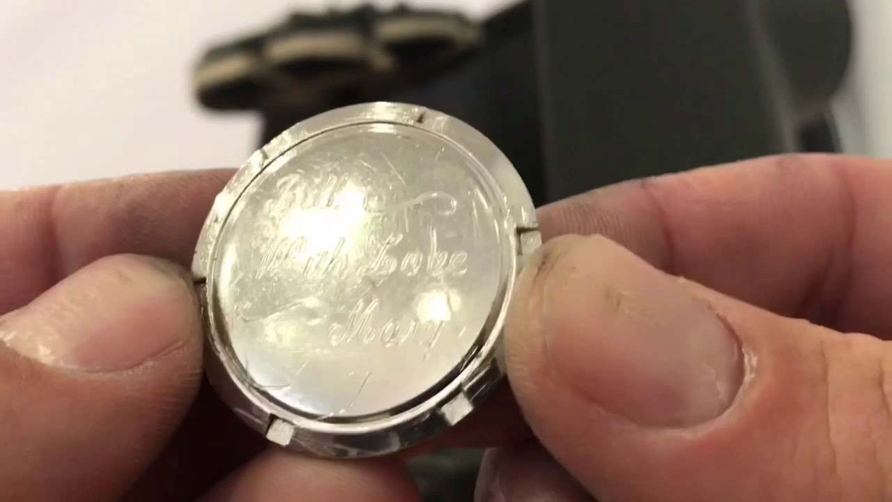 Removing engraving from stainless steel back case Omega watch