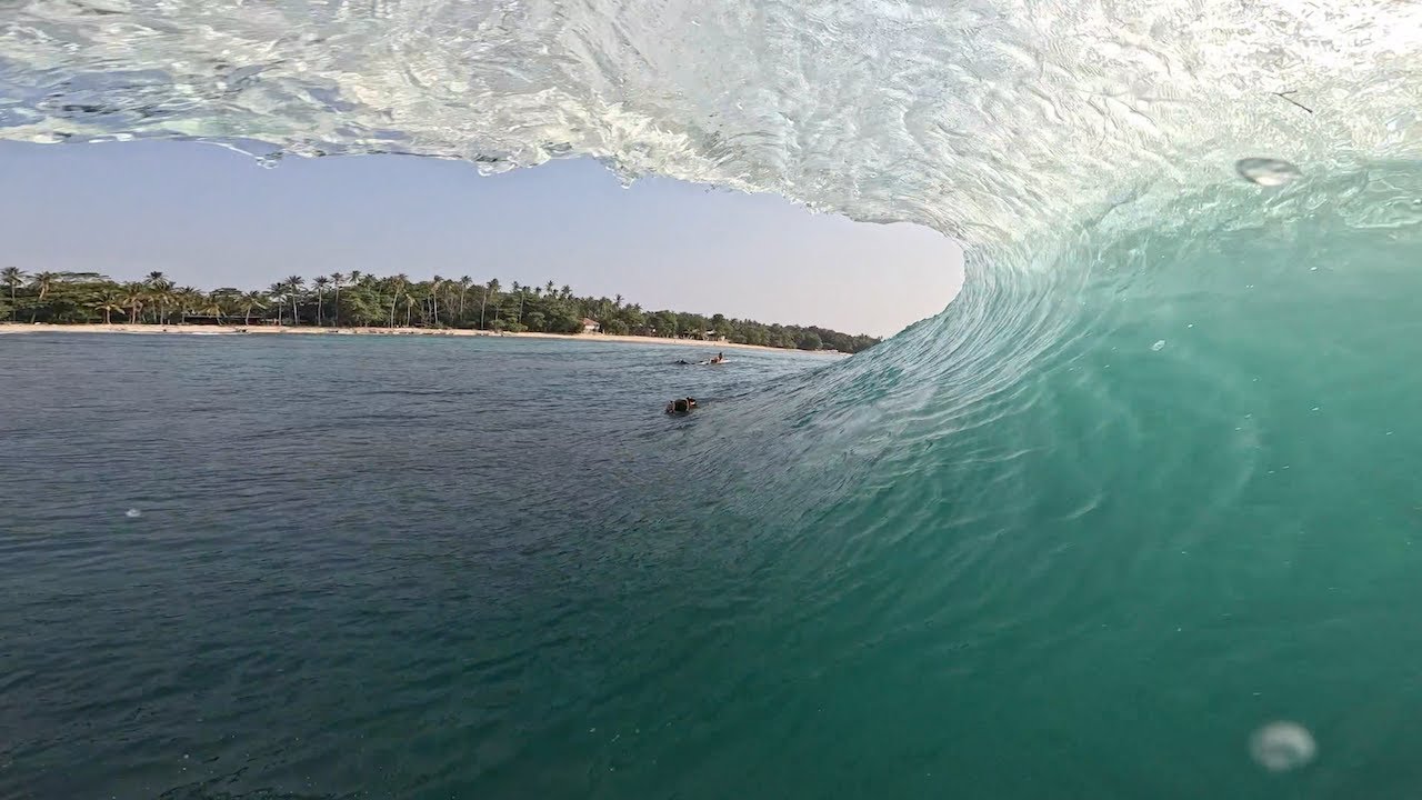 POV Barrels over shallow reef, Krui Indonesia