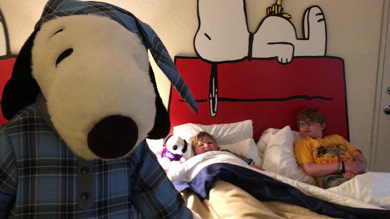 Getting Tucked Into Bed in Camp Snoopy Rooms at Knott's Berry Farm Hotel