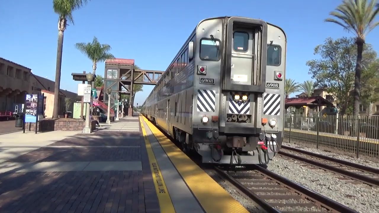 Southbound Metrolink Meets Westbound Pacific Surfliner, Knocks Down Signal At The End Of The Video