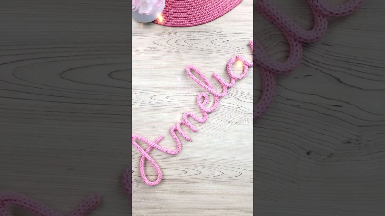 Amelia in Pink. Knitted Wire Name.