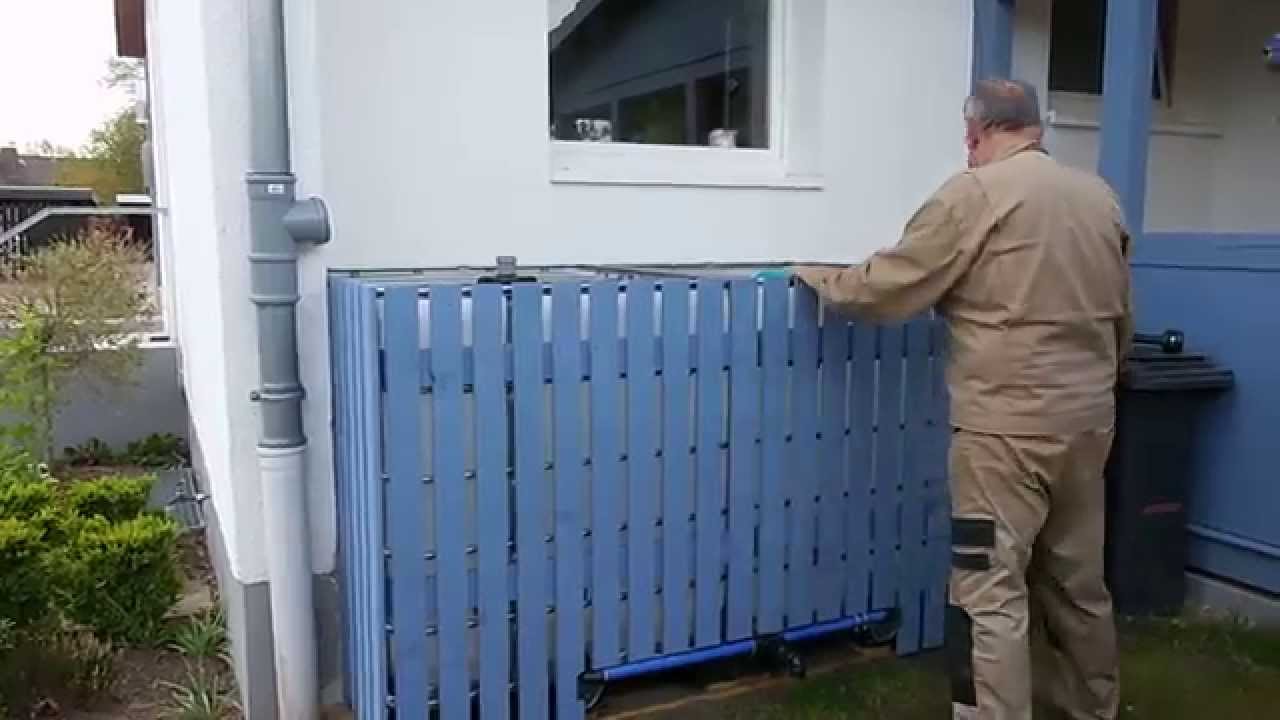 Regenwasser: Behälter aufstellen und verkleiden