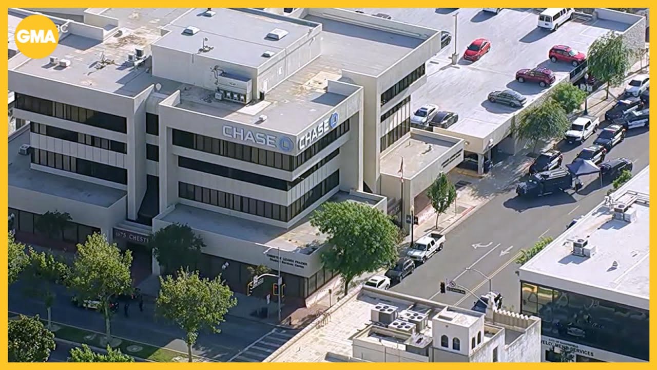 Man barricades himself inside bank with hostages after bomb threat