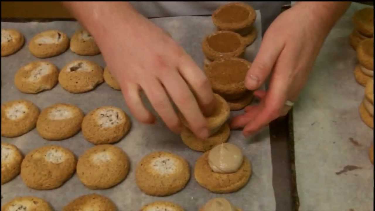 Hand making a Jap round almond and nougat biscuit | Roses the Bakers