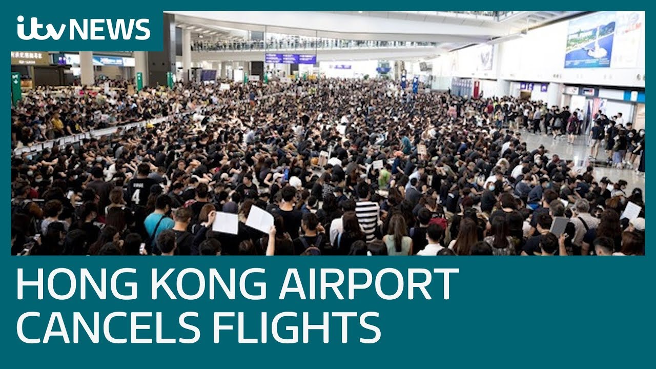 Hong Kong airport grounds all flights as protests continue | ITV News