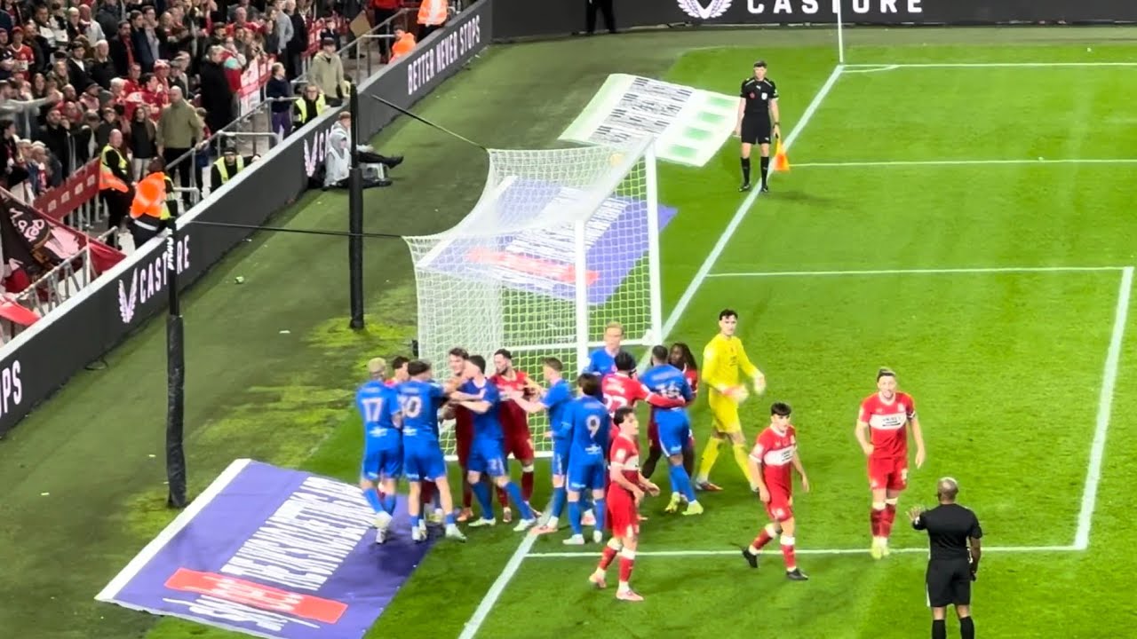 CHAOS AT MIDDLESBROUGH: Goalkeeper James Beadle knocks out defender
