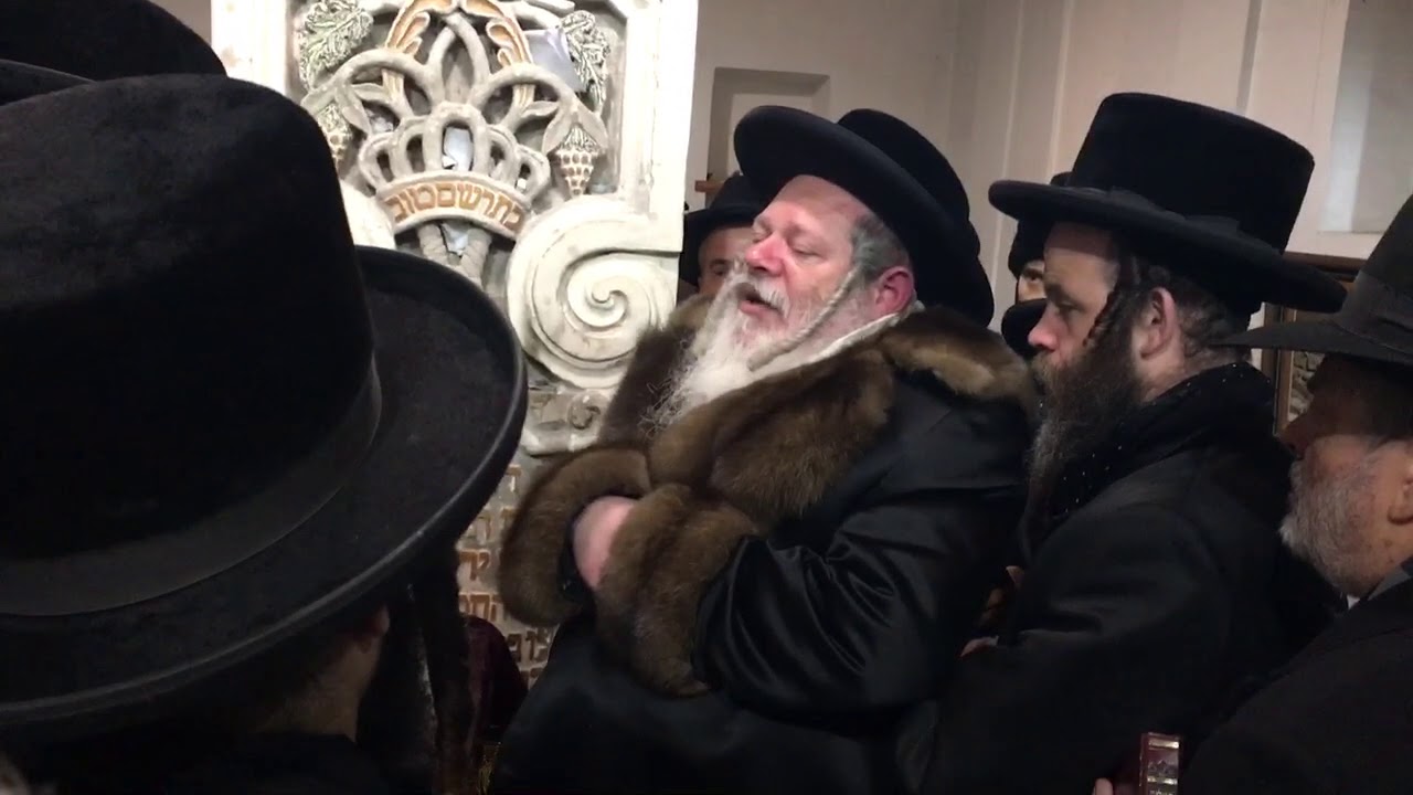 The Premishlaner Rebbe shlita speaking at the Ohel of Rabbi Meir’l of Premishlan zt