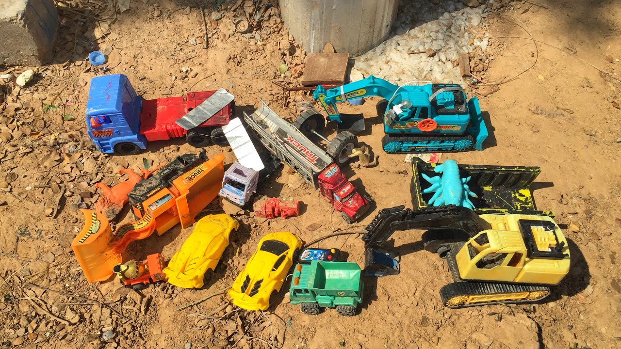 Mobil truck land truck ដេីររេីសកូនឡានតូច​ៗ​នៅ​តាម​មាត់​ទឹក​ ឡានដឹកដី​ អាអិច​កាយដី​ ក្រុមឡានដឹកដី
