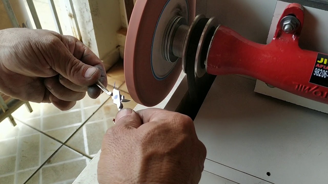 Máquina para afiar alicates de cutículas