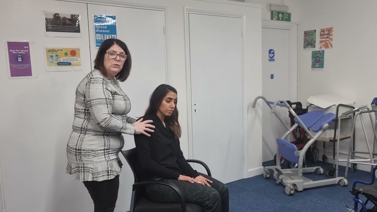 How to help and elderly client out of a chair