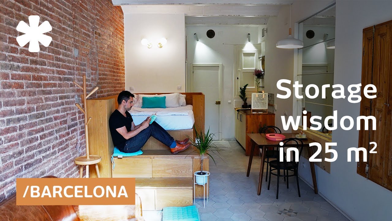 Bed, wardrobe & washer stack in Mediterranean tiny apartment