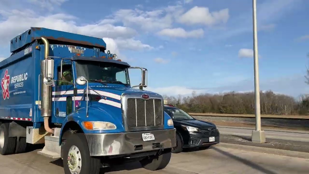 Garbage trucks entering and exiting the landfill 