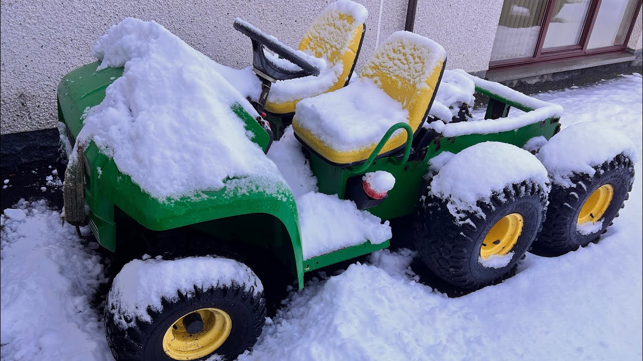 6x4 John Deere gator in snow