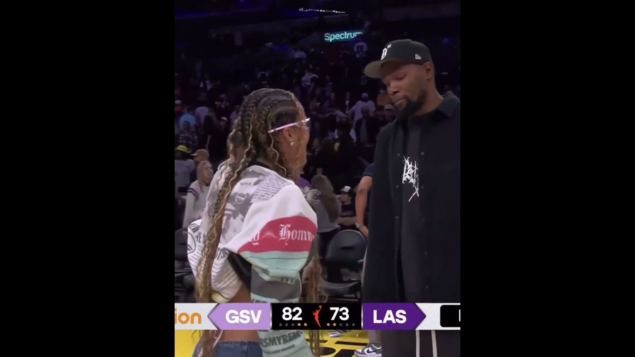 Rae Burrell makes sure she gets some time with Kevin Durant